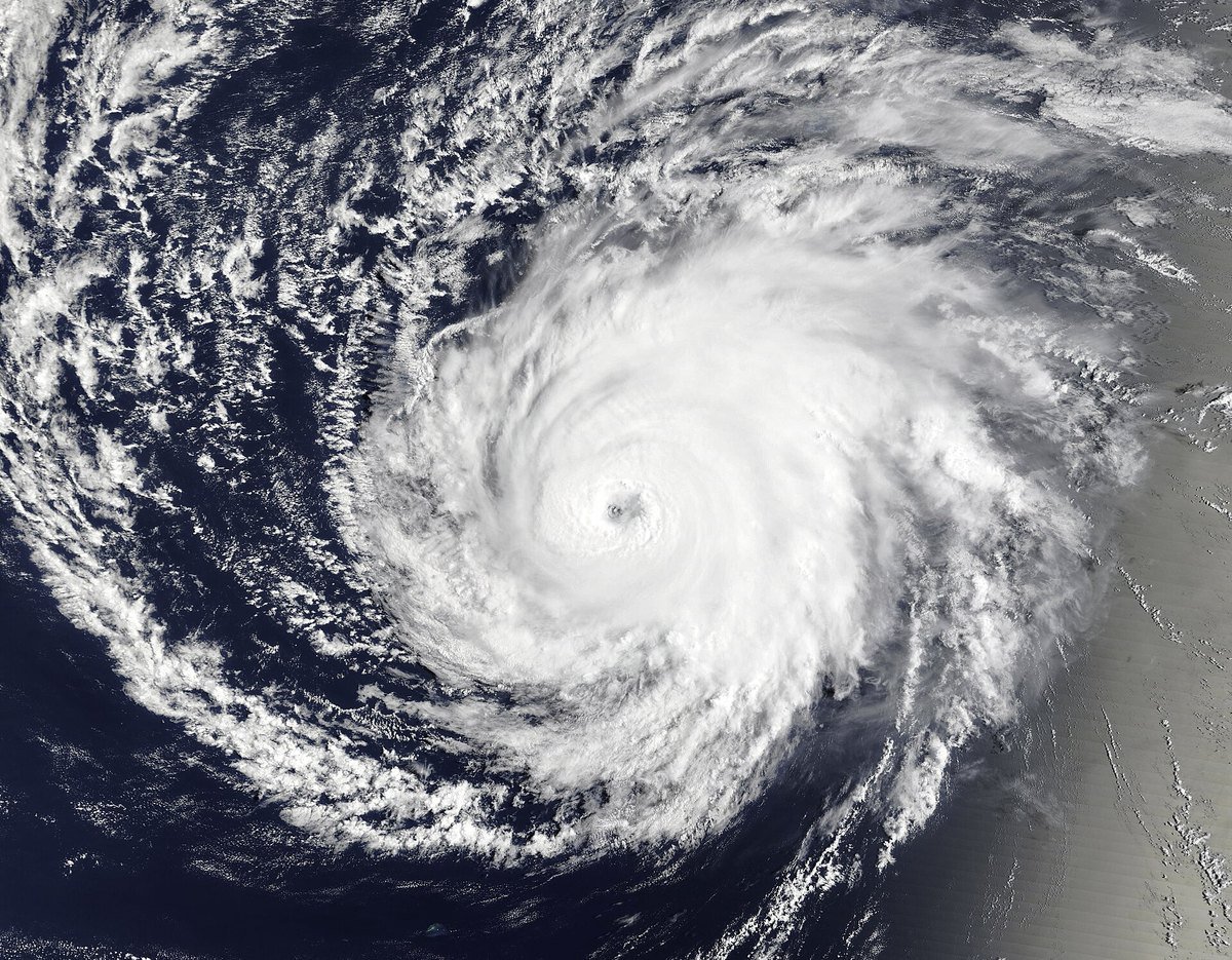 Satellite view of Hurricane Lala on August 18, 2026, a symmetrical major hurricane with a clear pinhole eye over open ocean