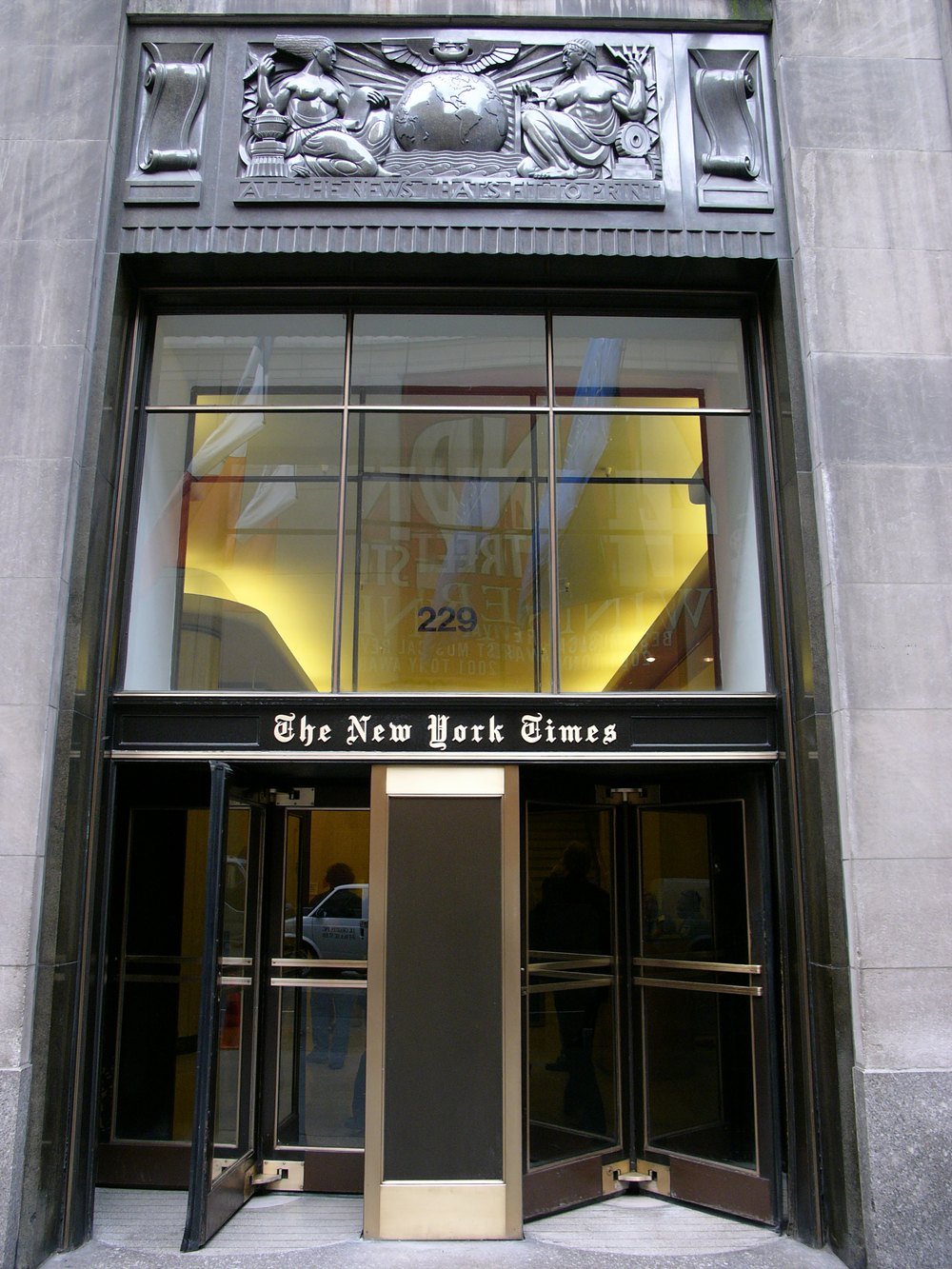 The revolving-door entrance to The New York Times building at 229 West 43rd Street