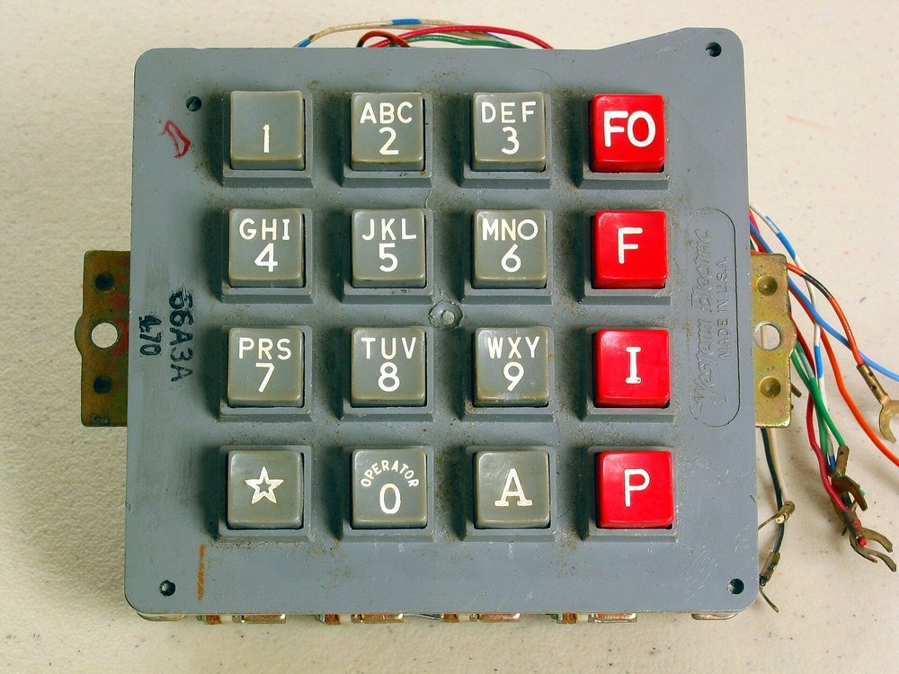 A Western Electric touch-tone keypad. The zero key is labelled OPERATOR.