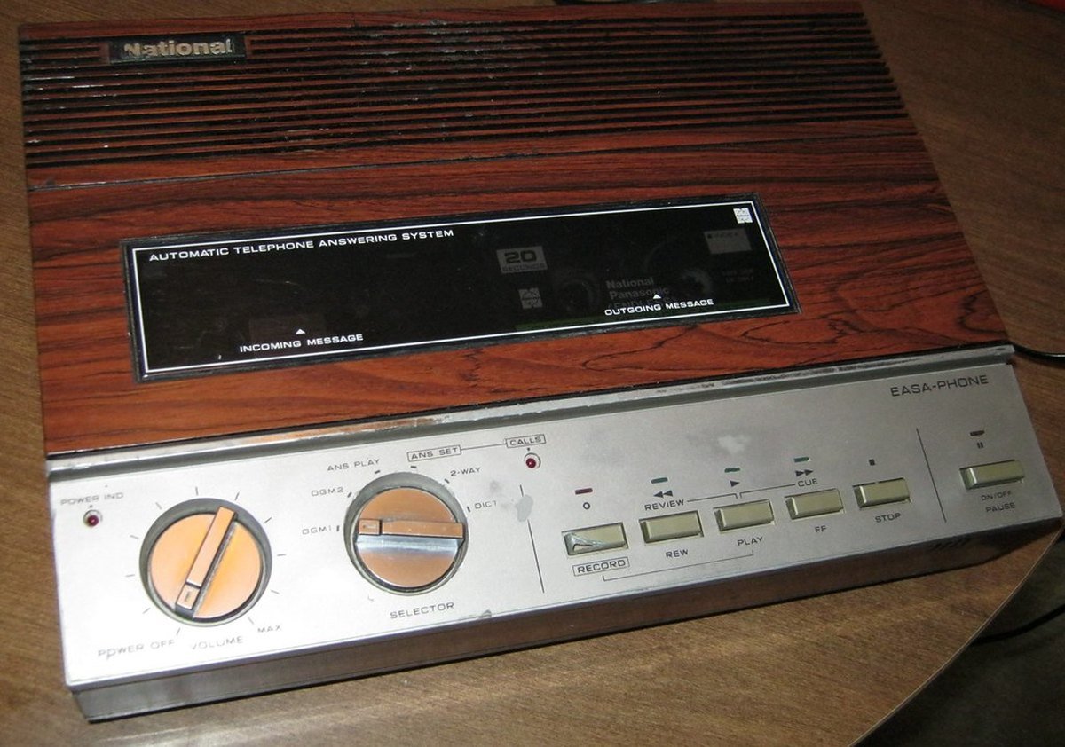 A vintage National Easa-Phone automatic telephone answering system with woodgrain casing and cassette controls