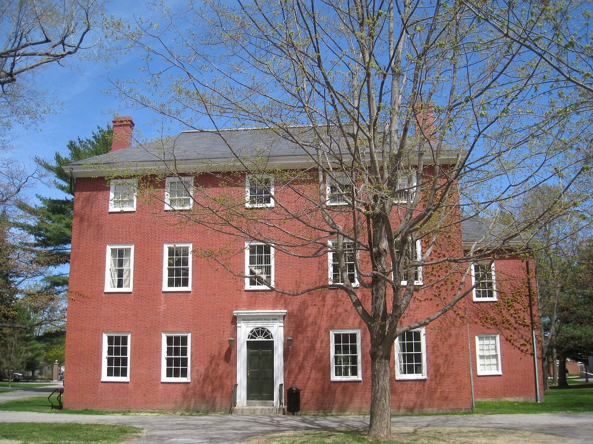 Massachusetts Hall, a red brick building dated 1802, on the Bowdoin College campus in Brunswick, Maine
