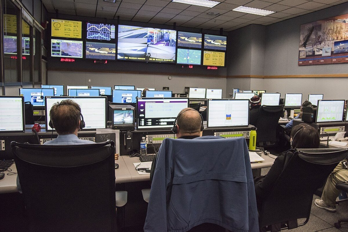 The work happens where the customers systems live, not at a demo table