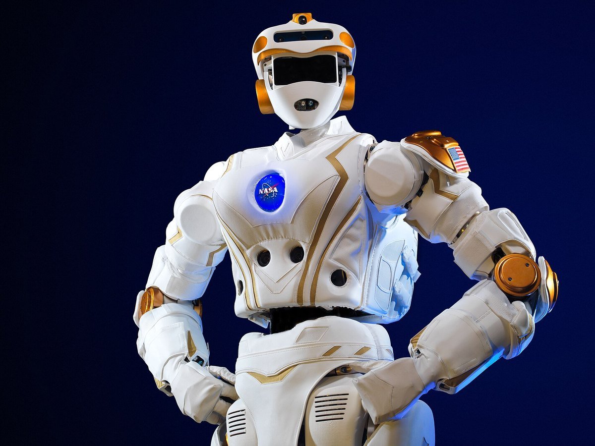 NASA Valkyrie humanoid robot standing against a dark blue background