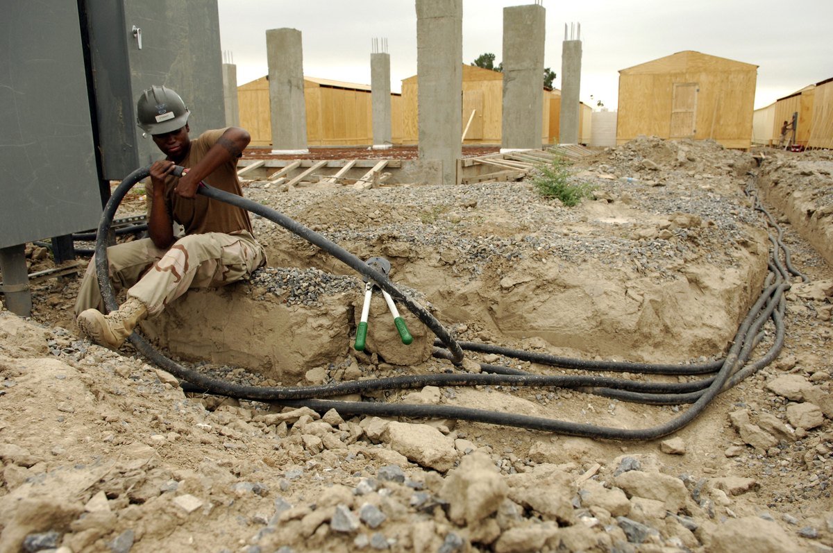The unglamorous middle of the job pulling power cable into a trench