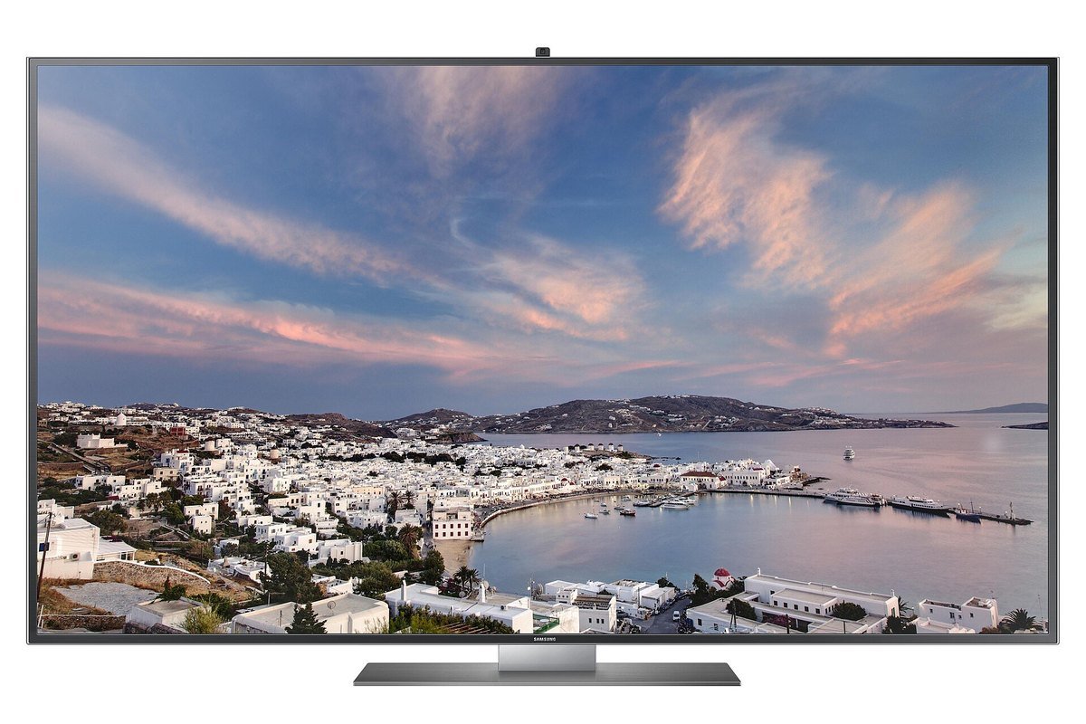 A Samsung flat-panel television displaying a coastal landscape