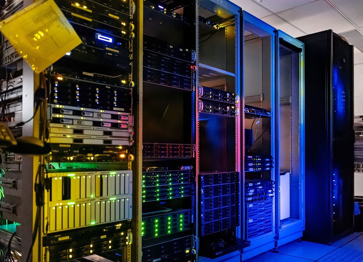 Illuminated server racks in a computer room