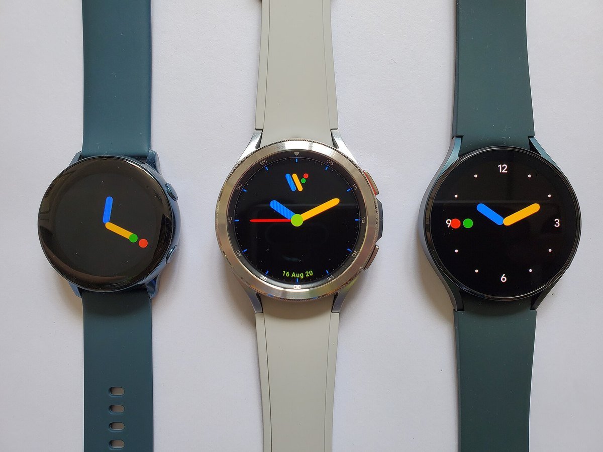 Three Wear OS smartwatches with Google-colored watch faces